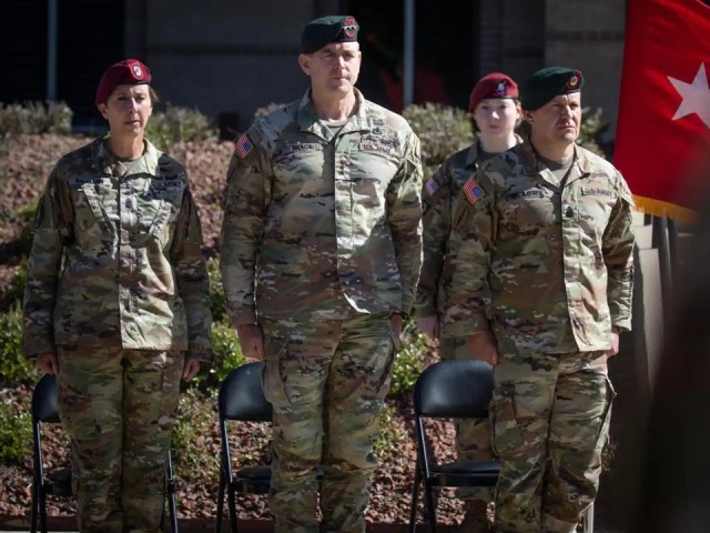 Lt. Gen. Jonathan Braga, USASOC commanding general (center), officiated the Change of Responsibility Ceremony by bidding farewell to Command Sgt. Maj. Michael R. Weimer and welcoming Command Sgt. Maj. JoAnn Naumann as the incoming command sergeant...
