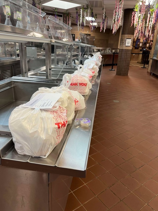 USASOC Soldiers, civilians, volunteer time to serve 750 Thanksgiving meals to those in in the Fort Liberty area.