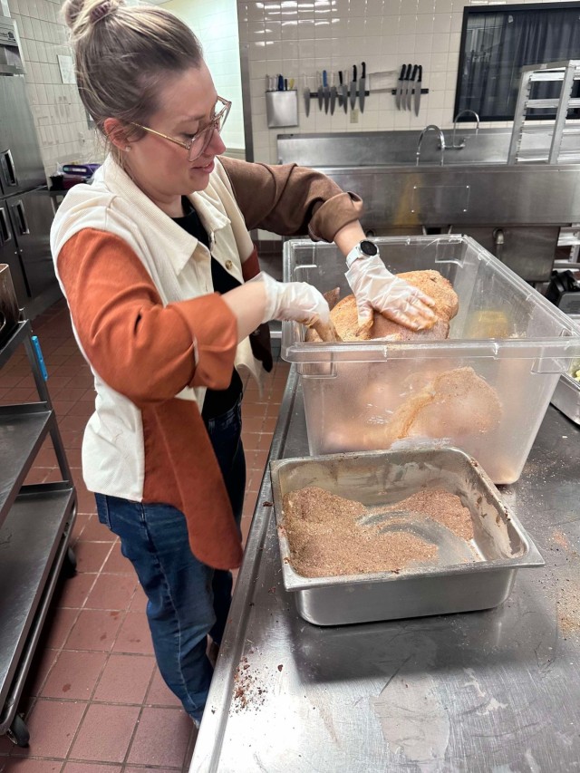 Tawni Dixon put in dozens of hours of her own time to plan and execute a Thanksgiving meal distribution that fed 750 people in the Fort Liberty area.